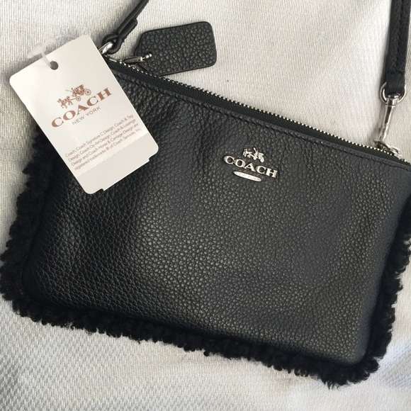 Coach Handbags - Fuzzy Black Coach Wristlet